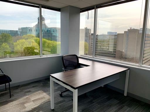 office with desk and chairs overlooking Stamford, CT
