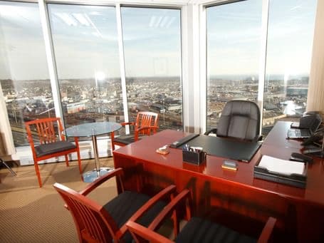 office with desk and chairs overlooking 1-95 in Stamford, CT