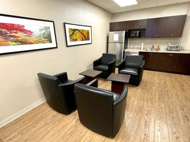 office kitchen with sitting area